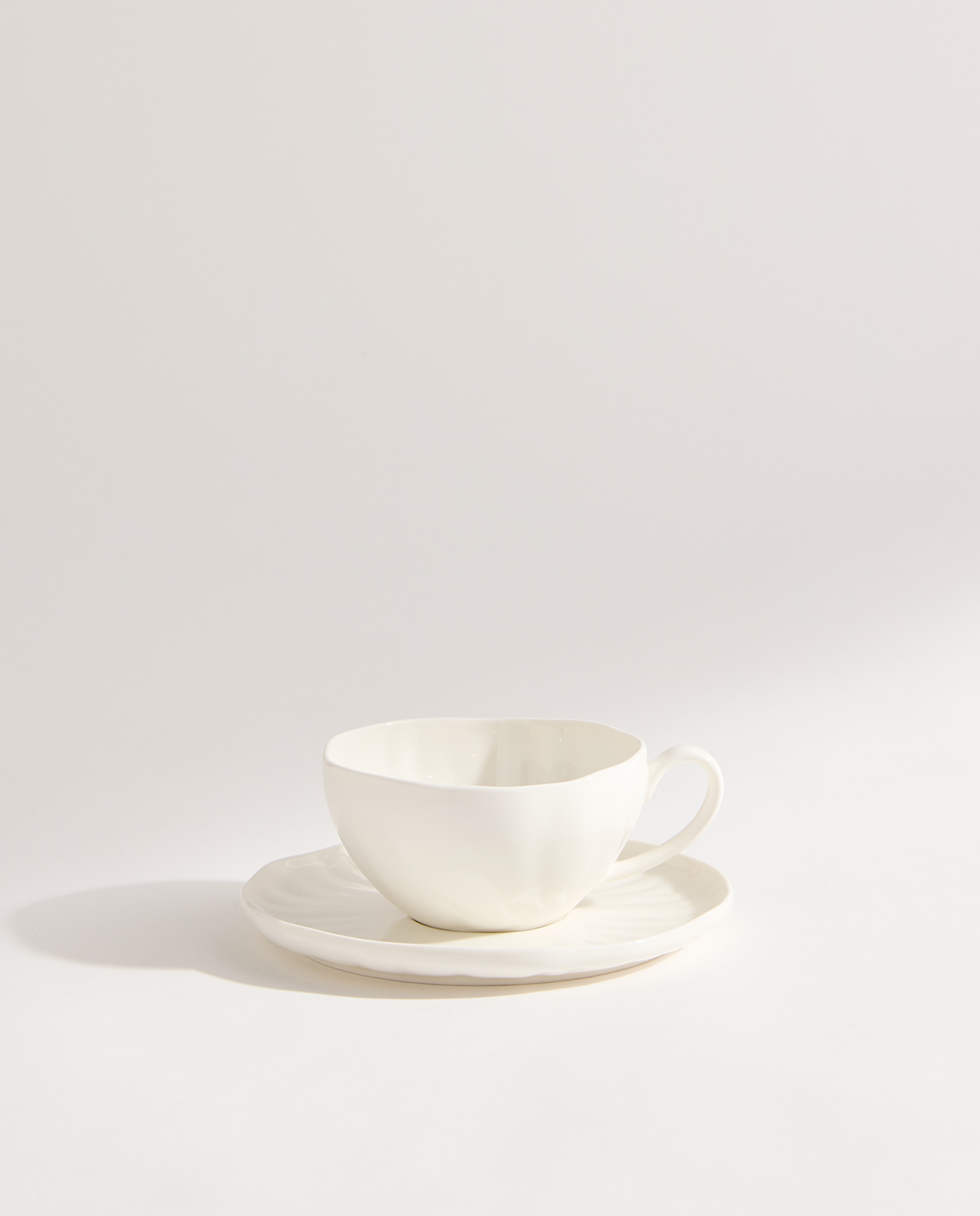 Taza de té con plato Lotus Blanco-2