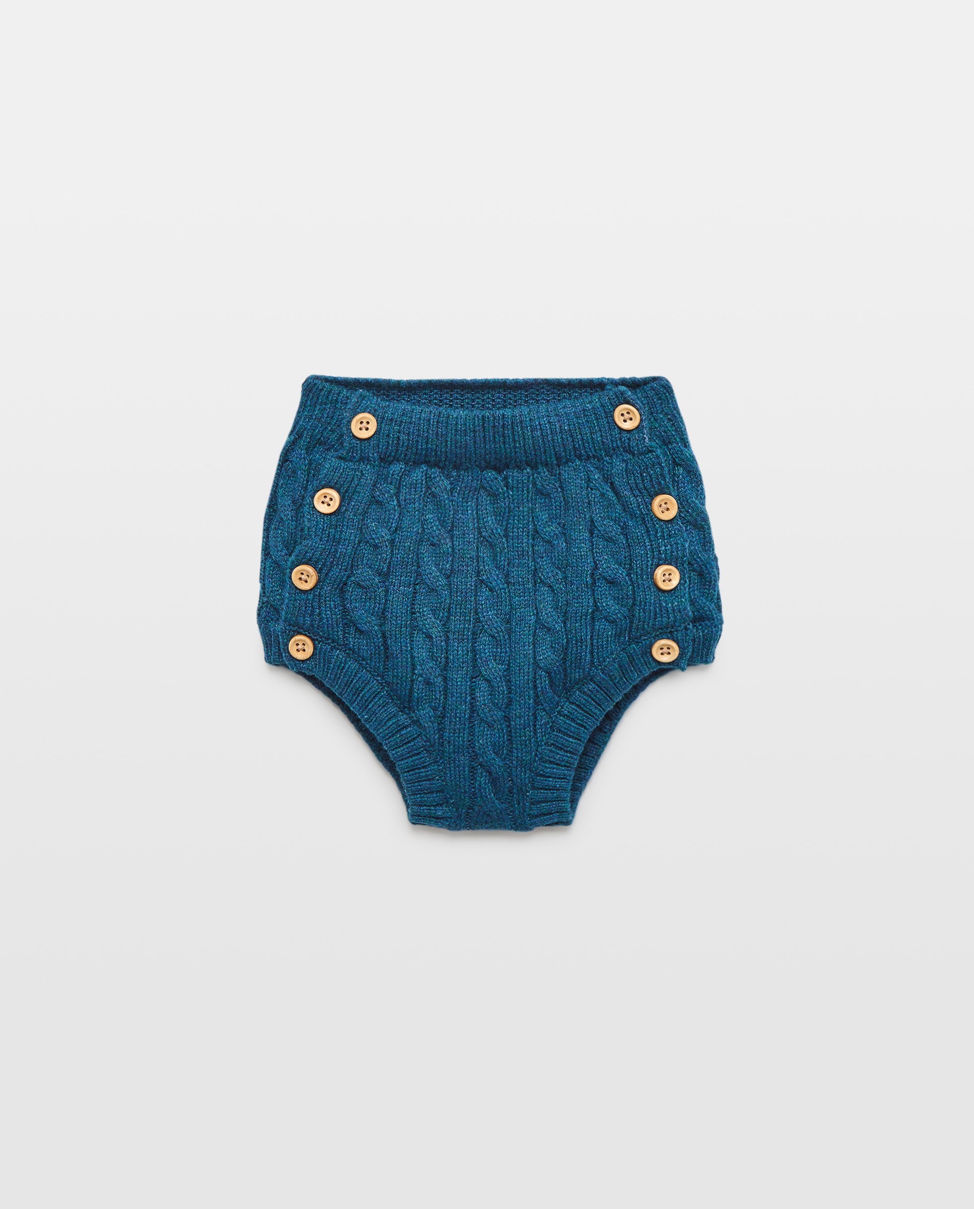 Imagen 0 de Cubrepañal de recién nacido tricot ochos