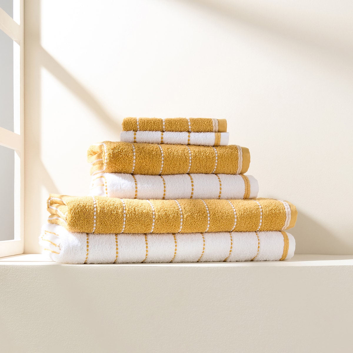 Juego de 6 toallas algodón 450 gr/m2 Islandia Basics El Corte Inglés Mostaza-1
