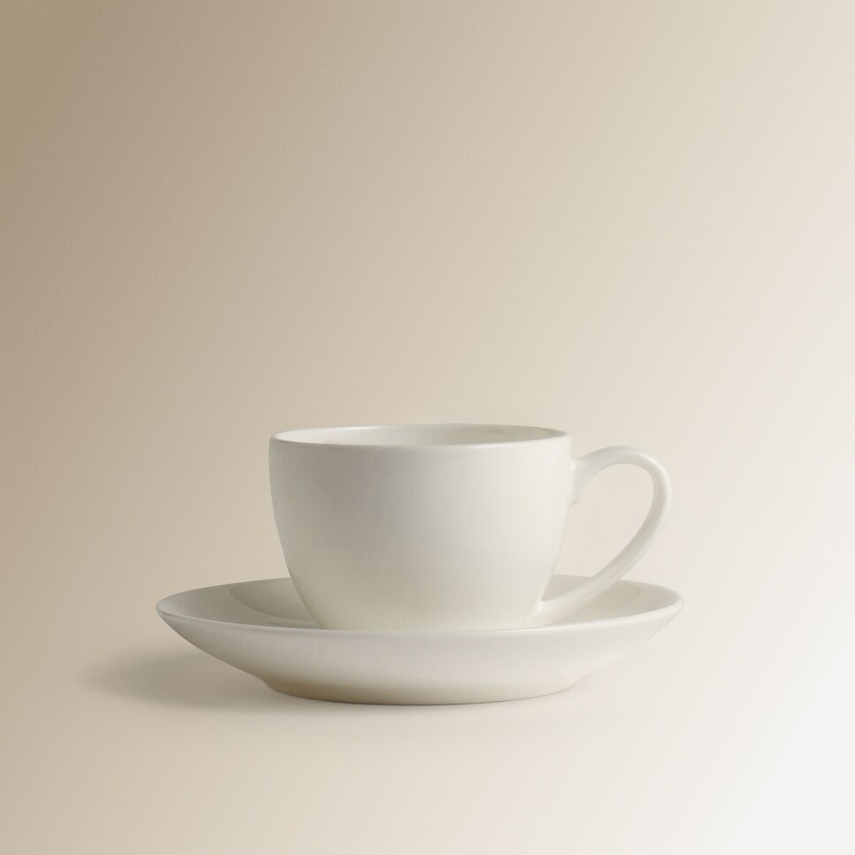 Imagen 1 de Taza de café con plato redondo Bone China Essential El Corte Inglés Blanco