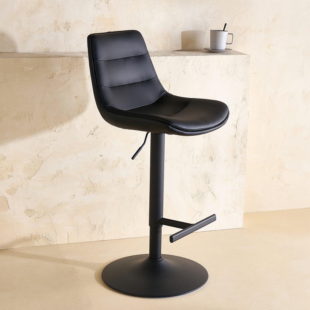 El Corte Inglés - Taburete elevable de símil piel Cedric.