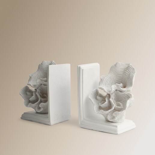 Sujeta libros Coral Mikonos