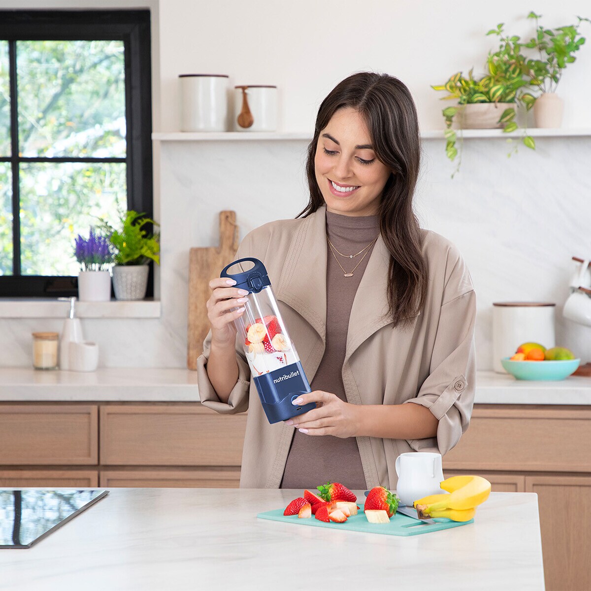Batidora personal Nutribullet Portable NBP003NBL con carga USB Navy-6