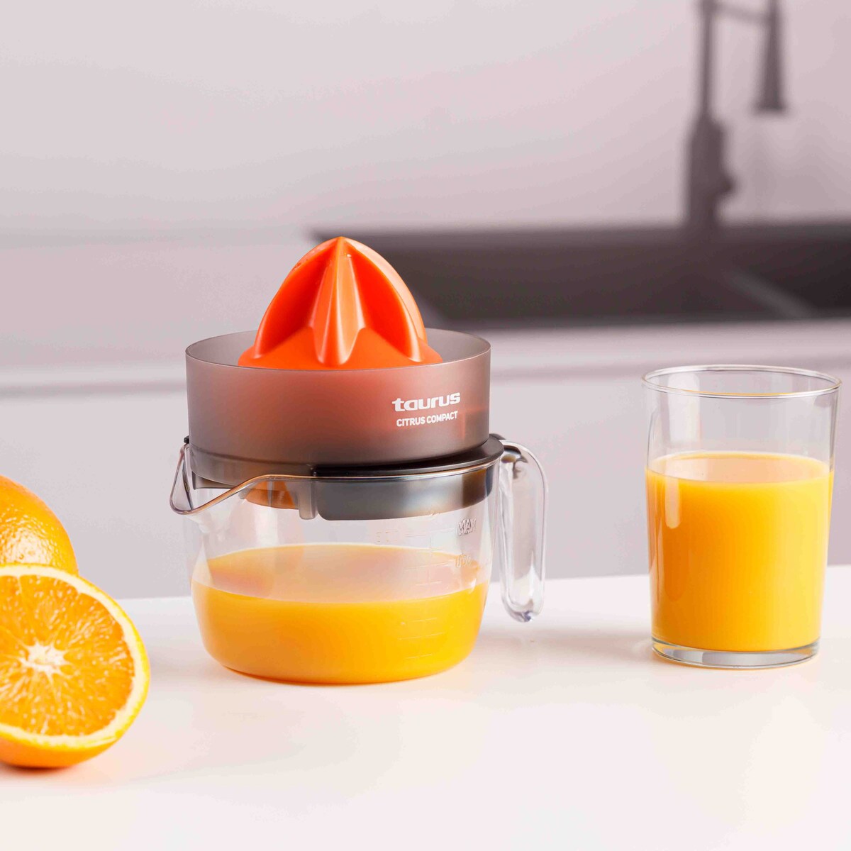 Exprimidor eléctrico Taurus Citrus Compact con doble sentido de rotación Transparente / Negro-11