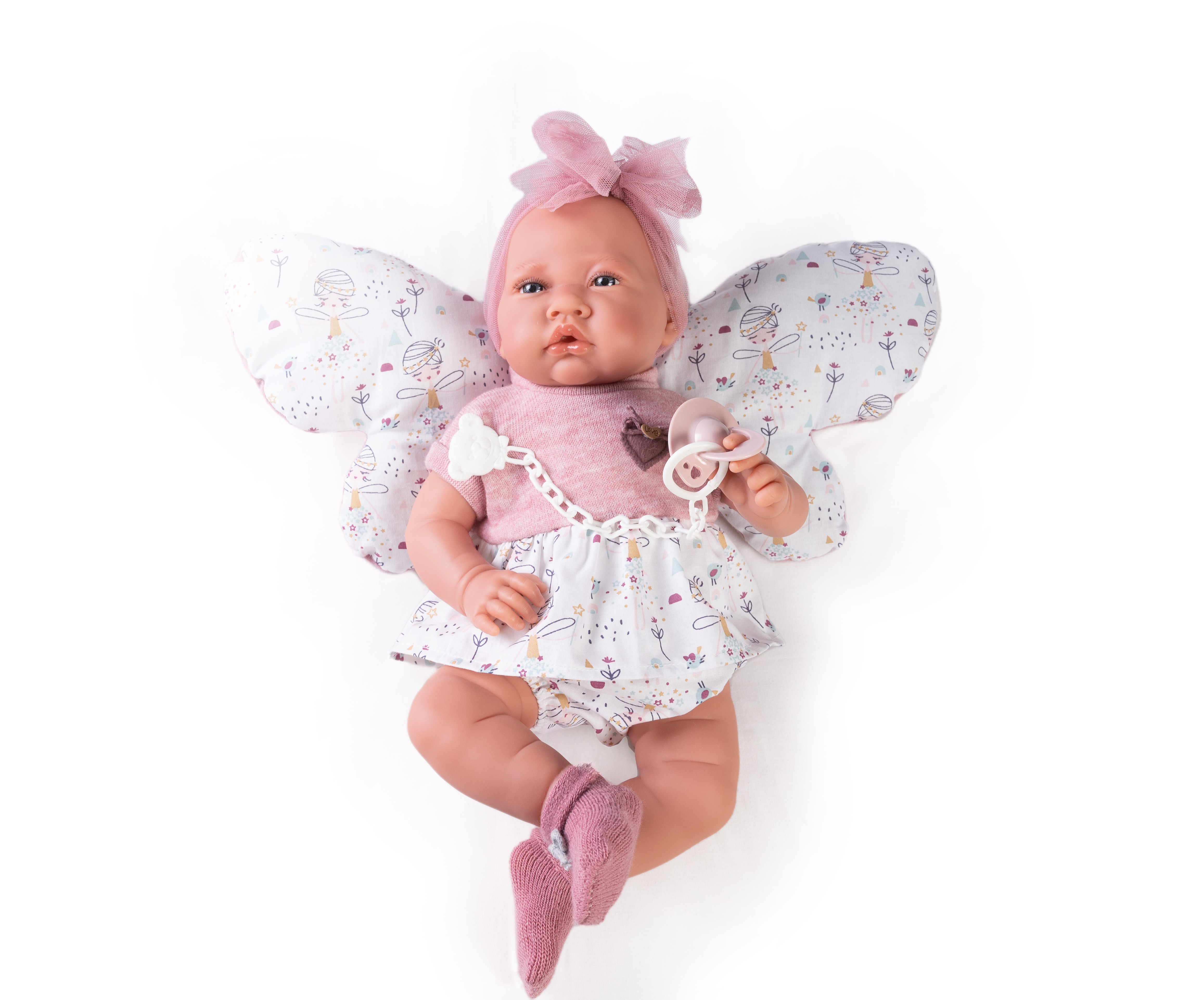 Recién nacida con cojín mariposa 4