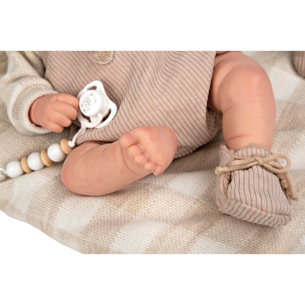 Bebé reborn 45 cm Rubén con cojín 4