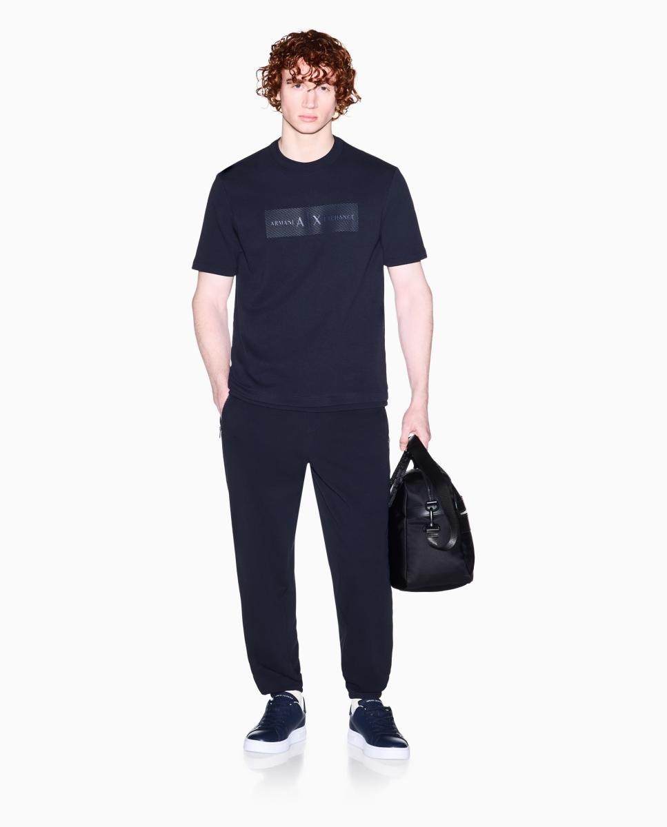 Armani Exchange - Pantalón jogger de hombre con bolsillos cremallera.