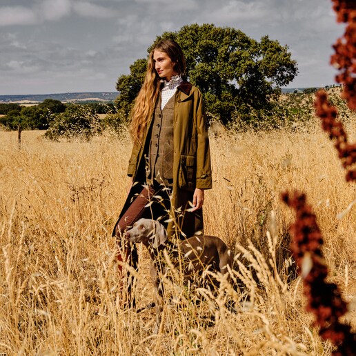 Imagen 0 de Abrigo largo encerado de mujer