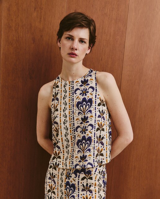 Imagen 0 de Top de manga corta abierto