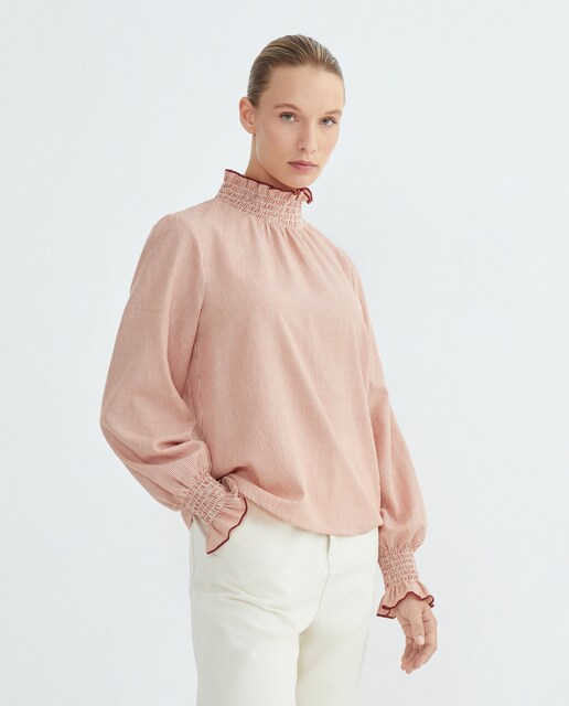 Imagen 0 de Blusa de mujer de cuello alto de rayas