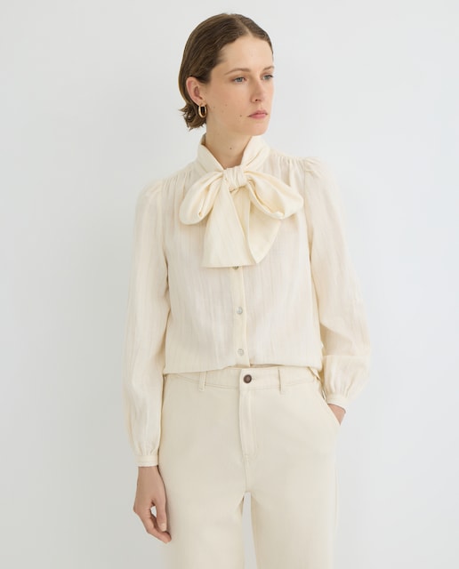 Imagen 0 de Blusa de mujer de lurex con lazada en cuello