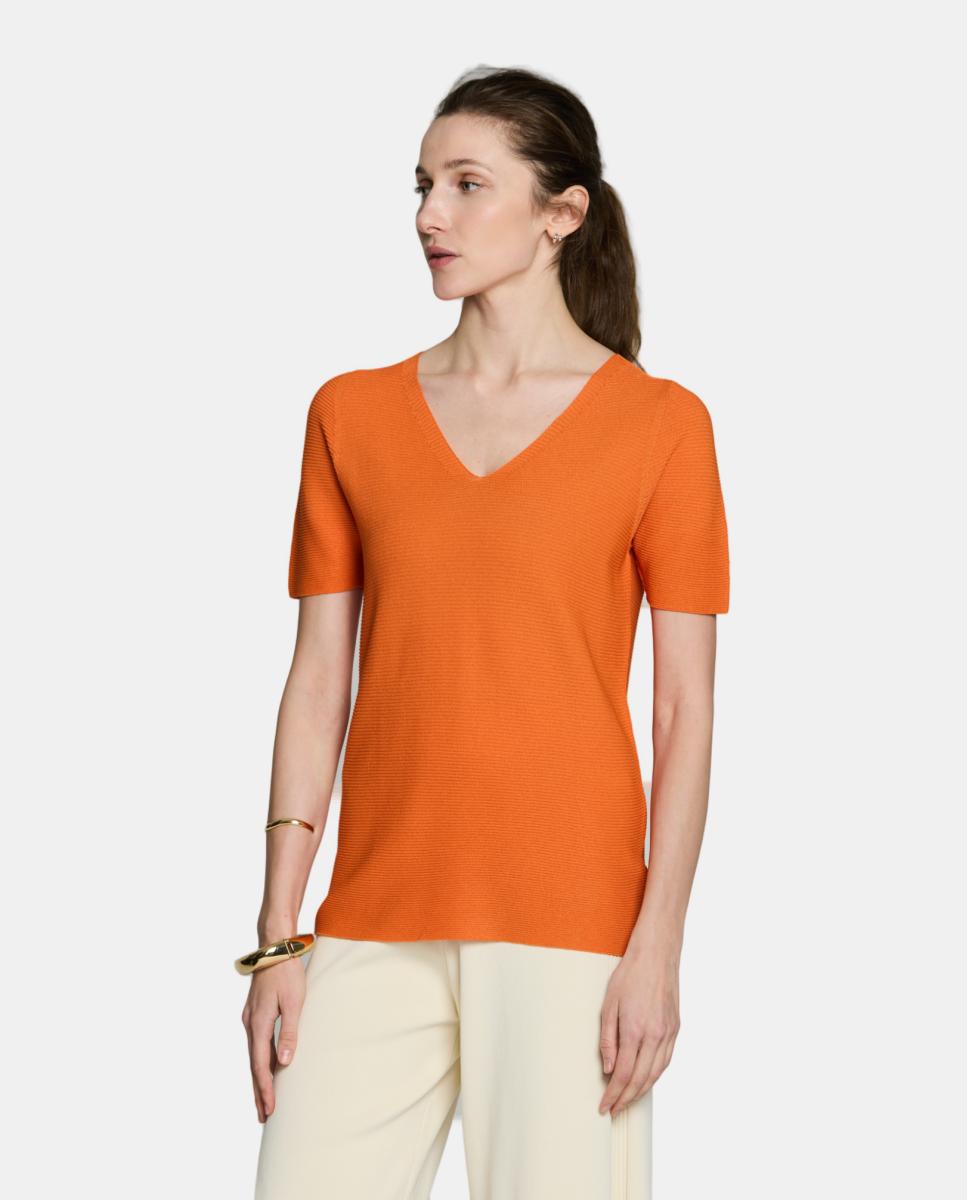 Camisola de malha com decote em bico e manga curta. Telha-1