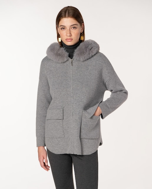 Imagen 0 de Chaqueta de mujer de punto con capucha y pelo natural