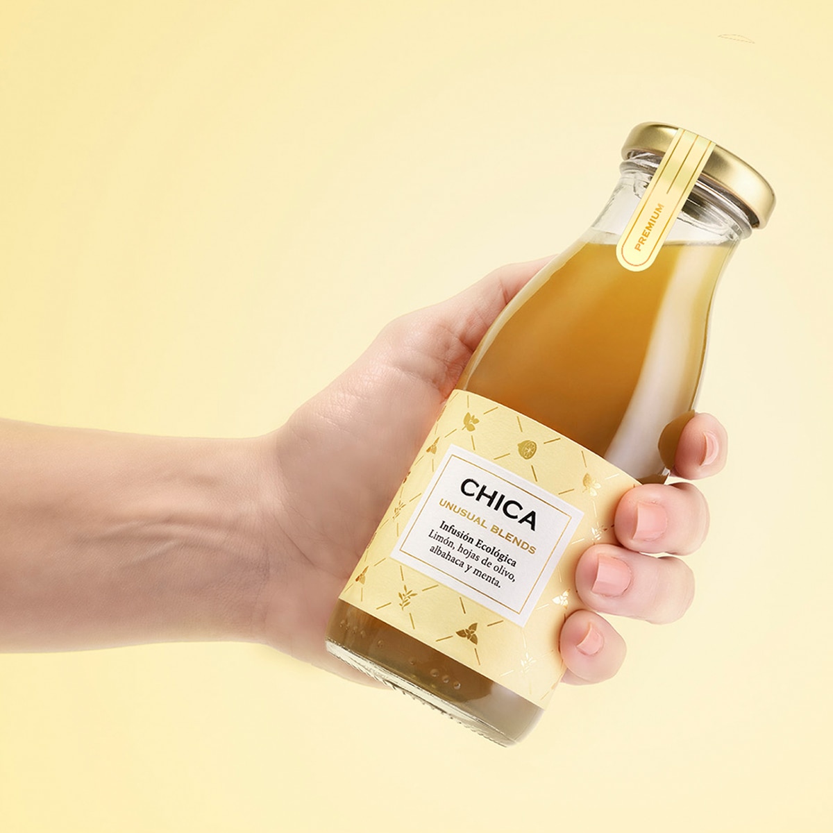 Bebida ecológica infusionada de limón, hojas de olivo, albahaca y menta, sin gluten, Chica 3