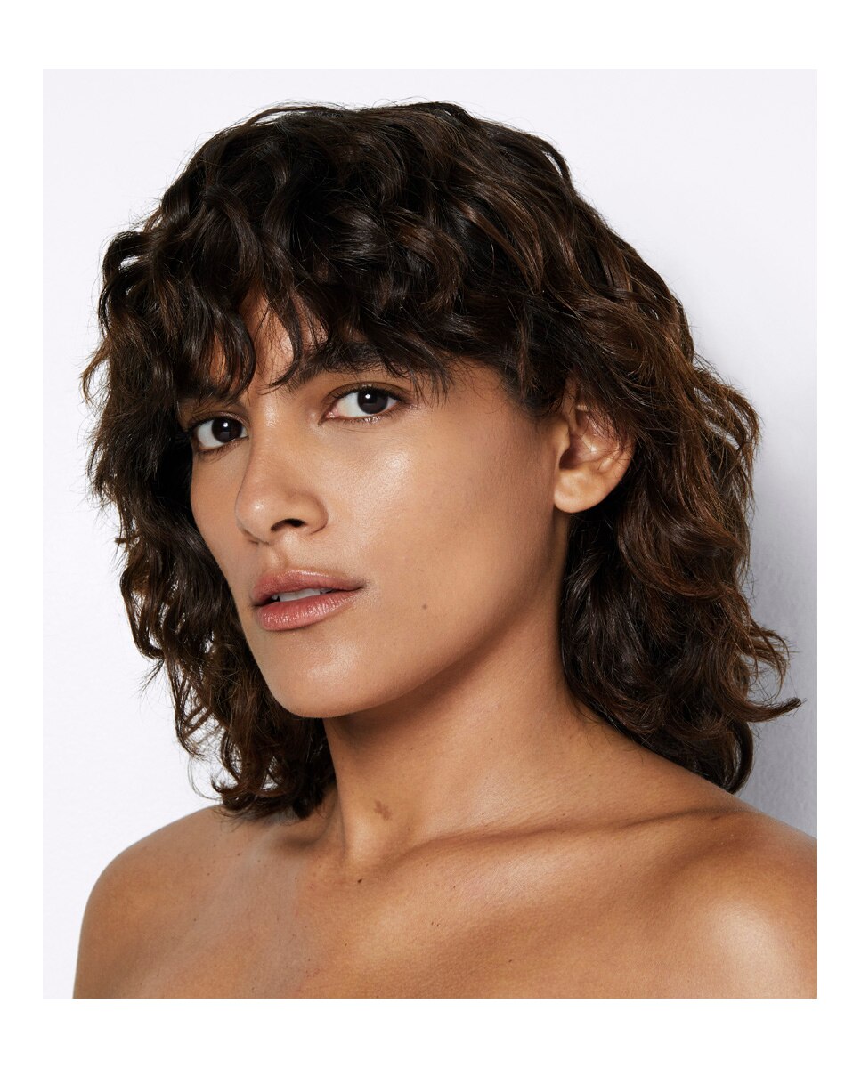 Base de maquillaje Light Reflecting Skin Foundation Nars - ARUBA ARUBA-4