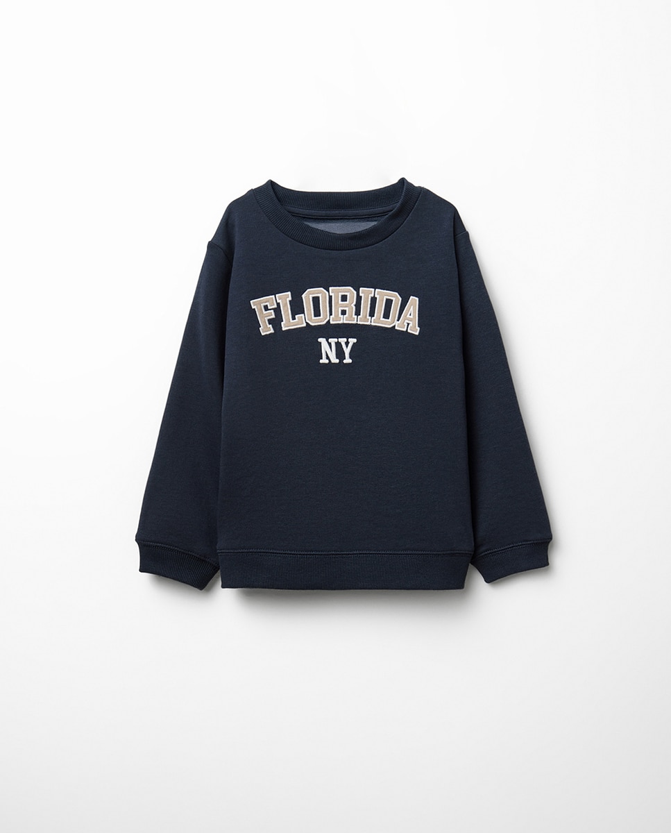 Imagem 0 de Sweatshirt Universitária com Patch de Sarja