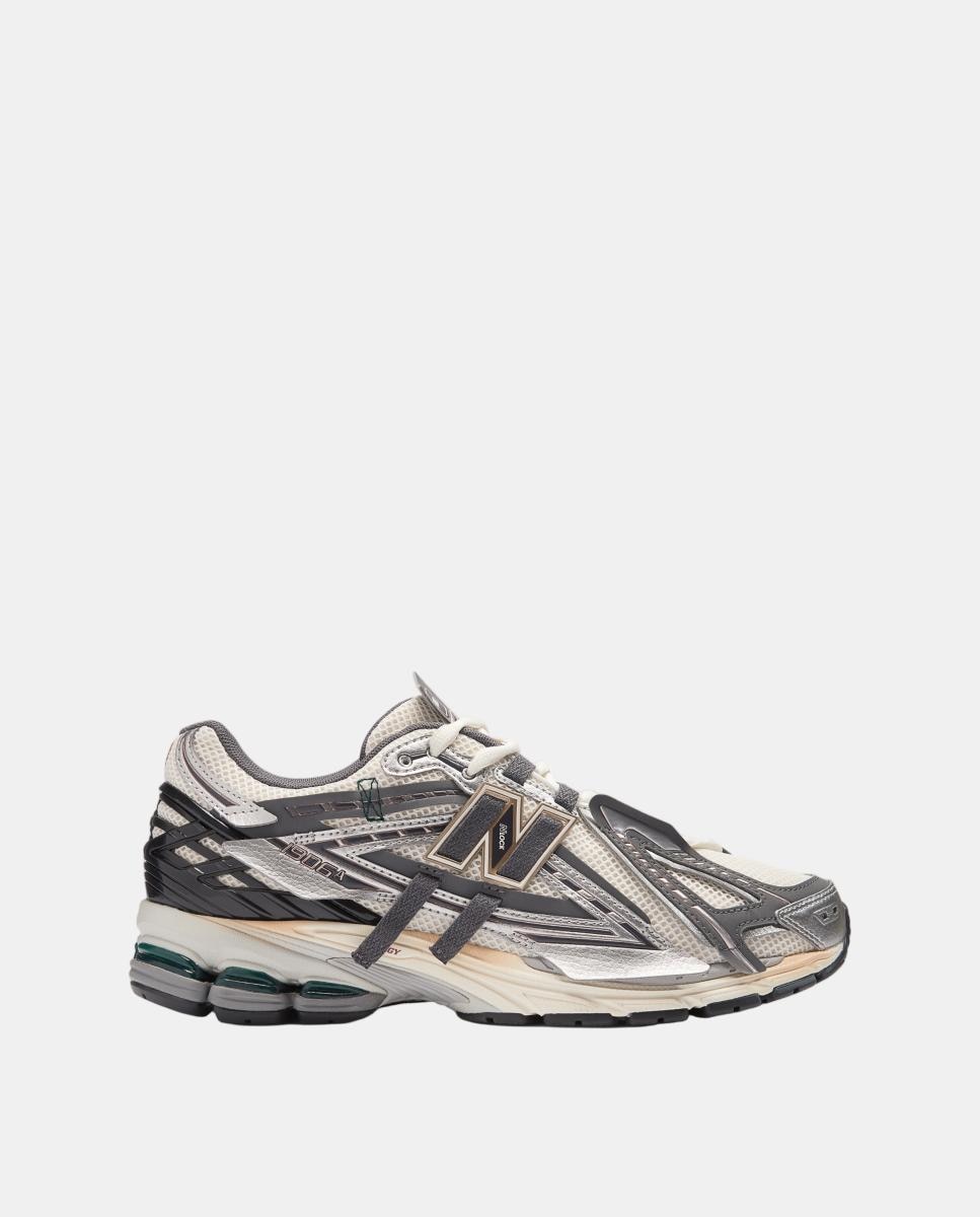 Imagen 0 de New Balance 1906A para hombre y mujer Gris