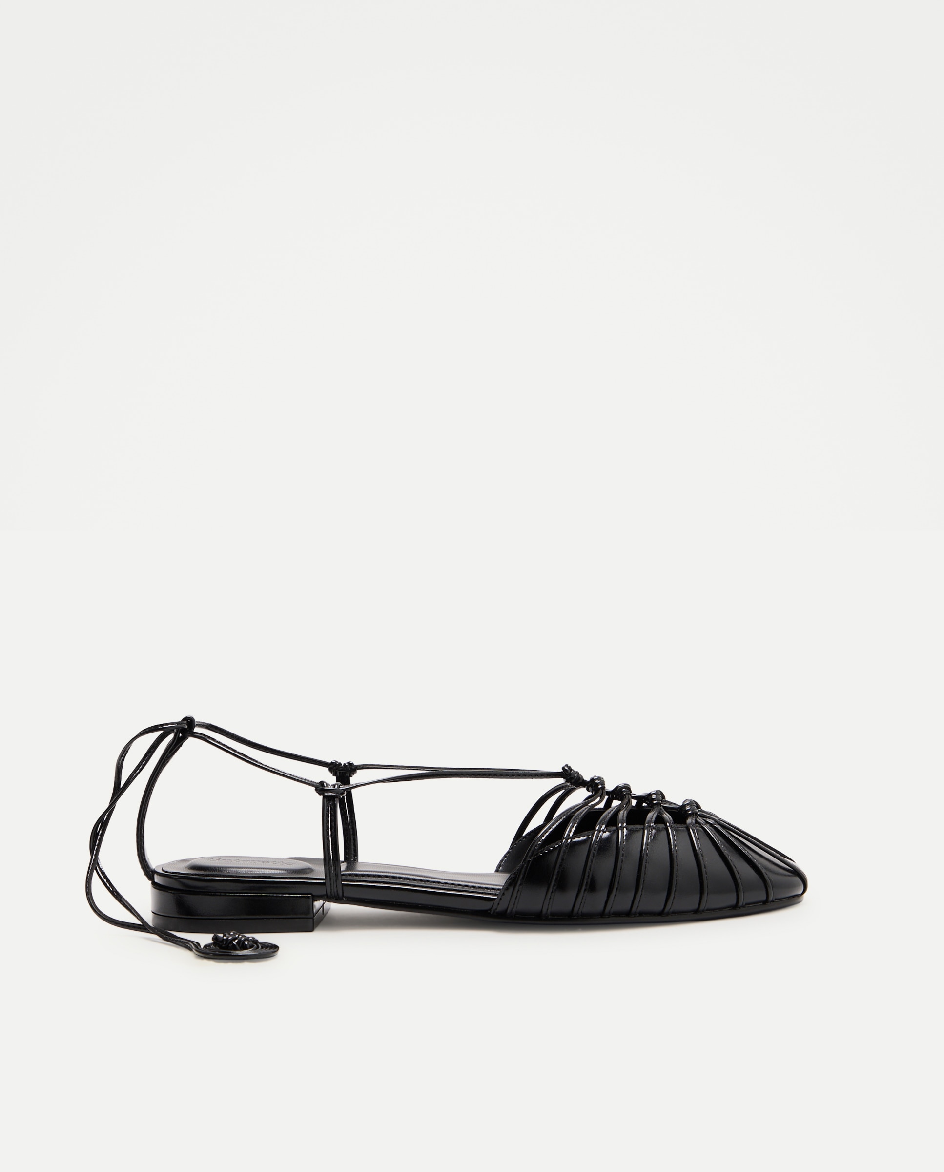 Imagen 0 de Zapatos planos de mujer con nudos Negro