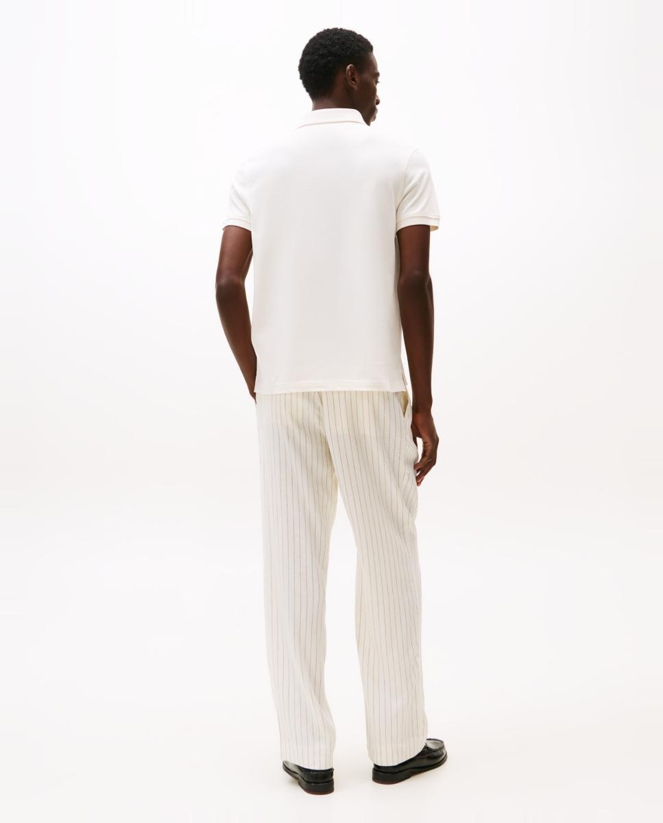 Imagen 2 de Polo regular con bandera bordada de Tommy Hilfiger - Amarillo Blanco