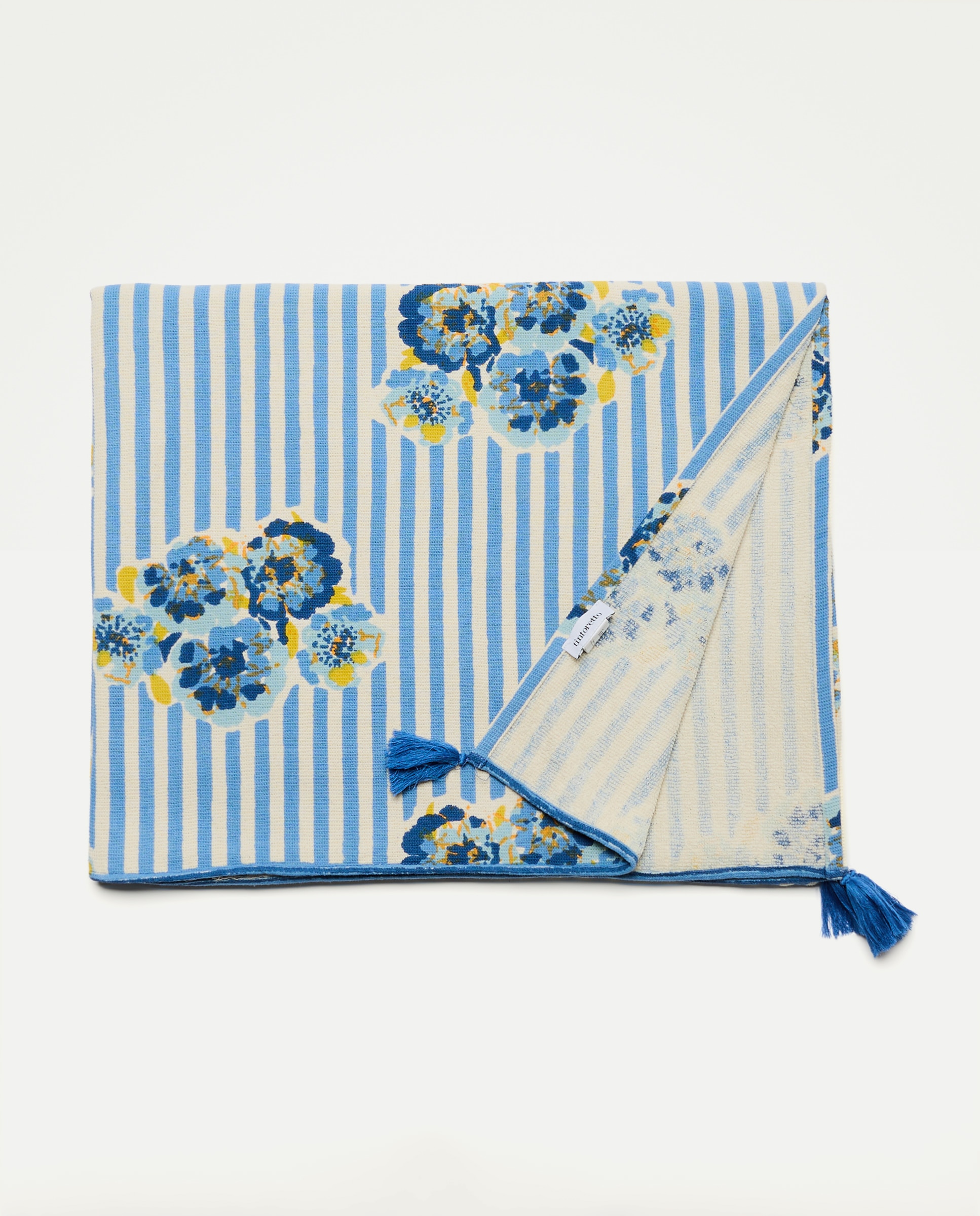 Imagem 0 de Toalha de Praia com Estampado Floral e de Risca com Mala