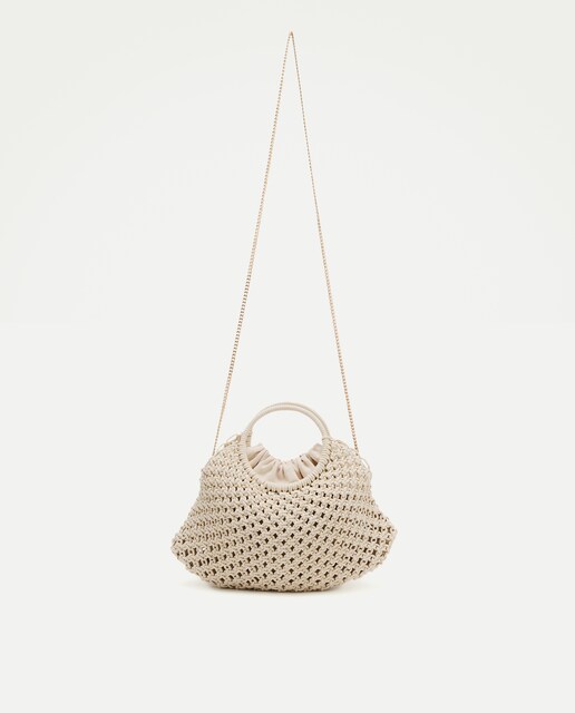 Bolso trenzado artesanal con asa circular
