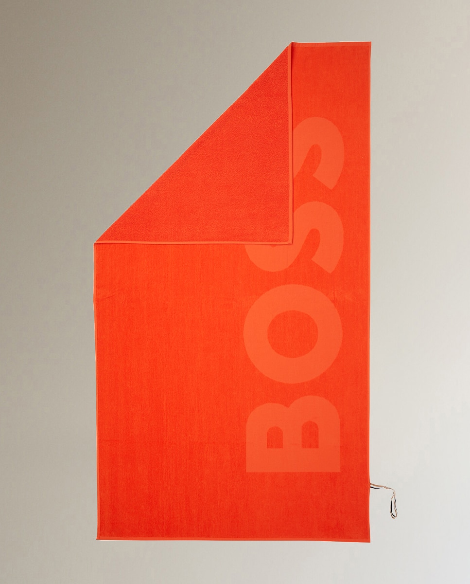 Toalla de playa Zuma Hugo Boss Naranja 100 x 180 cm · El Corte Inglés