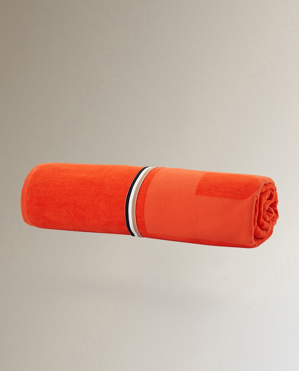 Toalla de playa Zuma Hugo Boss Naranja 100 x 180 cm · El Corte Inglés