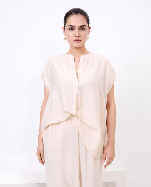 Imagen 0 de Top liso de manga corta de mujer