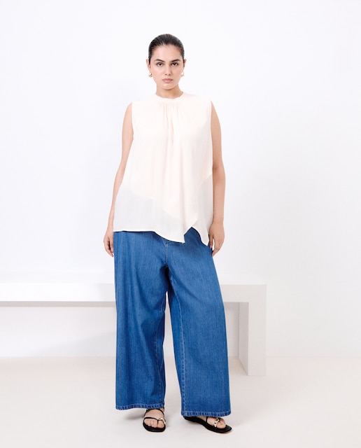 Imagen 0 de Top liso de manga corta de mujer