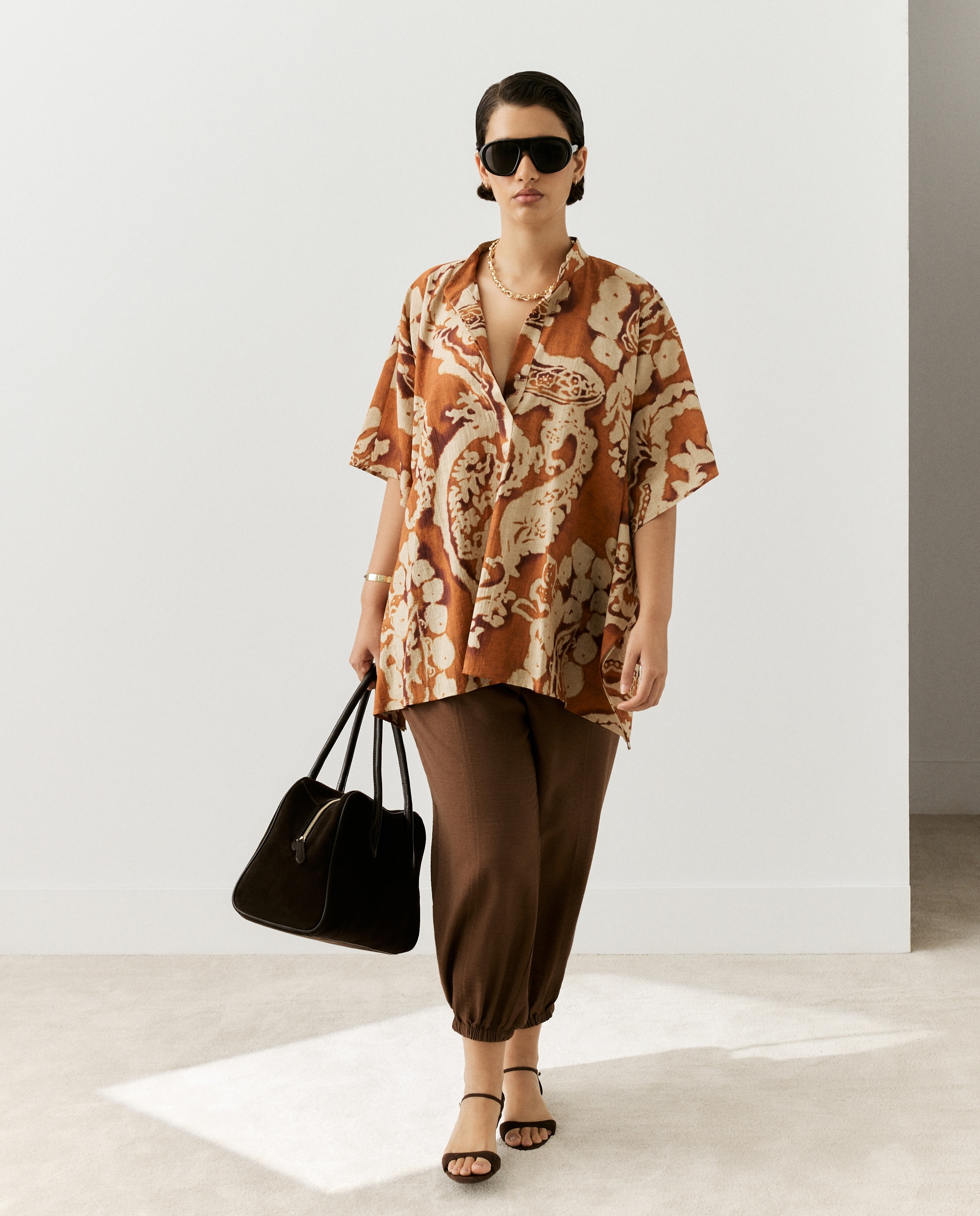 Imagem 0 de Blusa de mulher com gola à padre