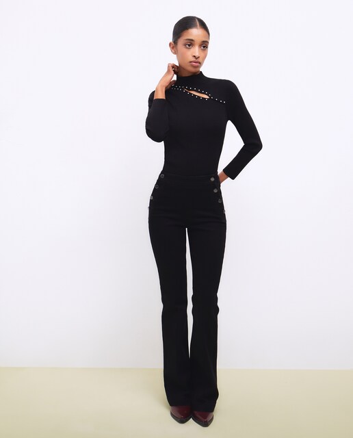 Pantalón vaquero de mujer flare botonadura tiro alto