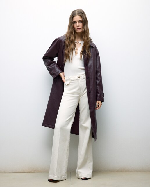 Pantalón de mujer flare cadena tiro medio