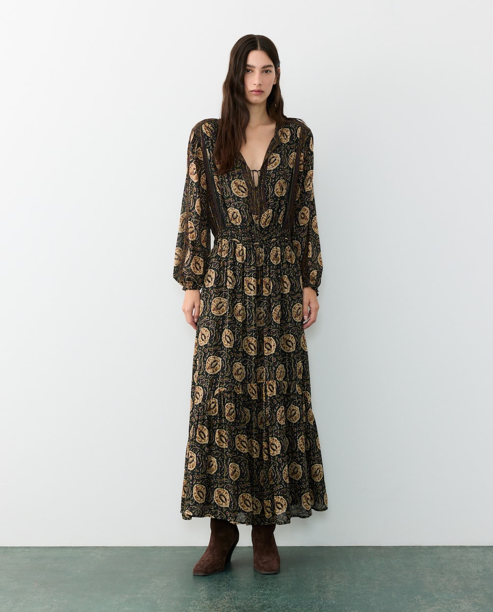 Imagen 0 de Vestido largo de mujer con lúrex y manga larga Negro