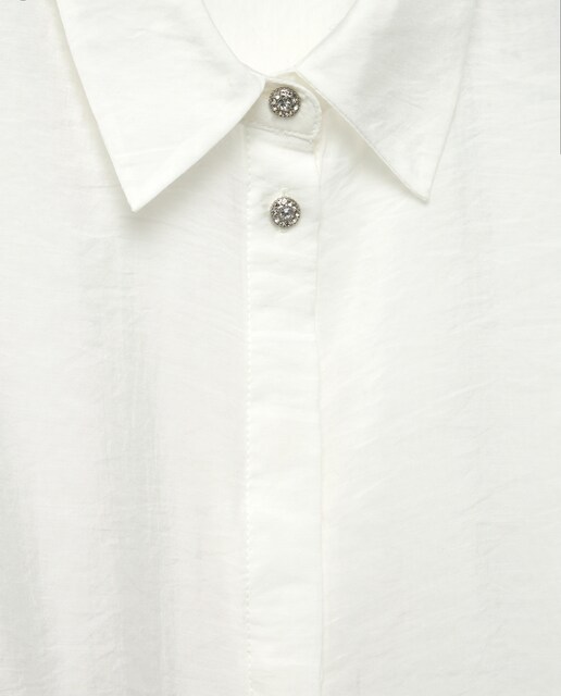 Blusa de mujer botón joya