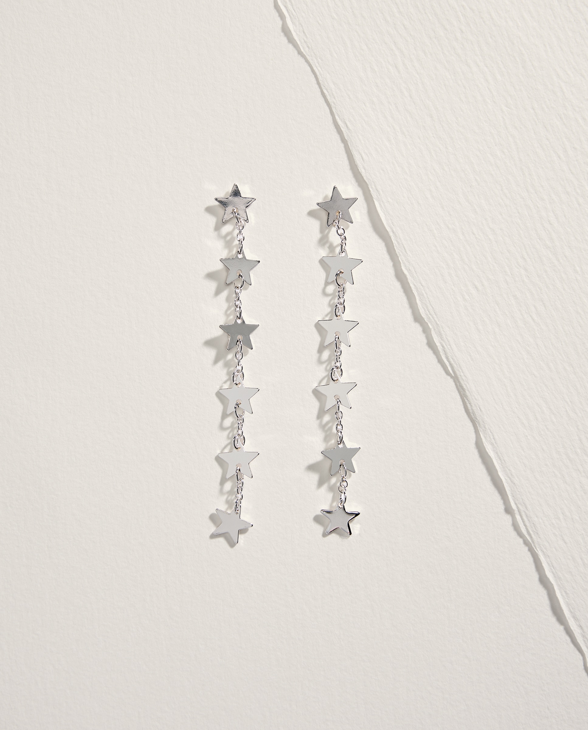 Imagem 0 de Brincos Compridos com Estrelas