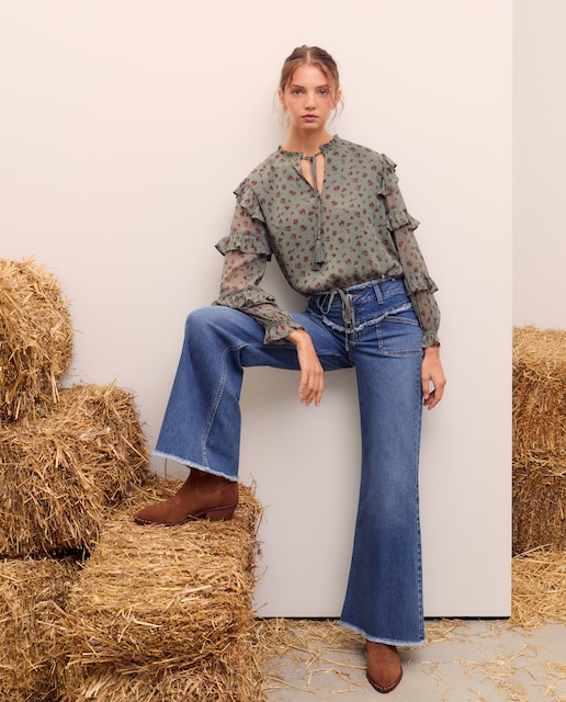 Imagen 0 de Top de mujer romántico con volantes de manga larga