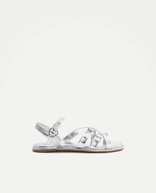 Sandalias planas de niña con tiras