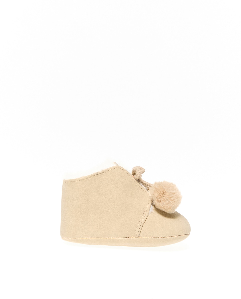 Imagem 0 de Botas de Tricot com Pompons