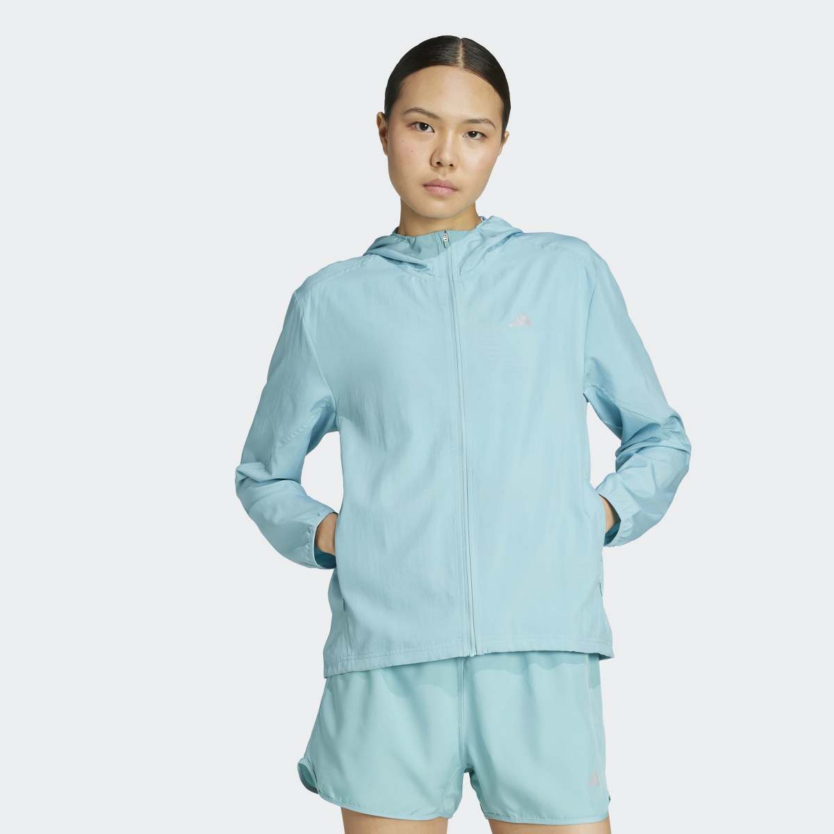 Casaco Corta-Vento de Mulher Run It Turquesa-1