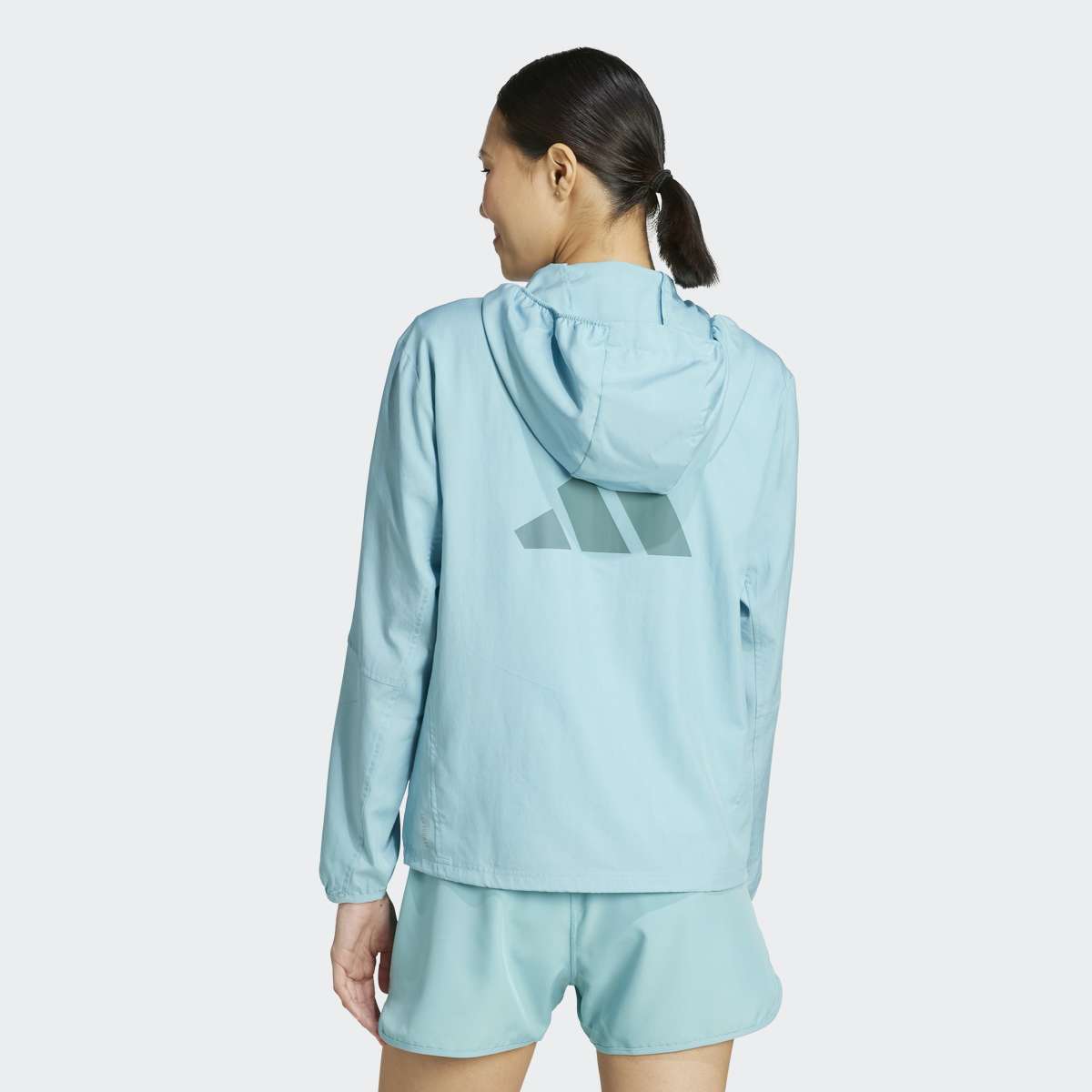 Casaco Corta-Vento de Mulher Run It Turquesa-2