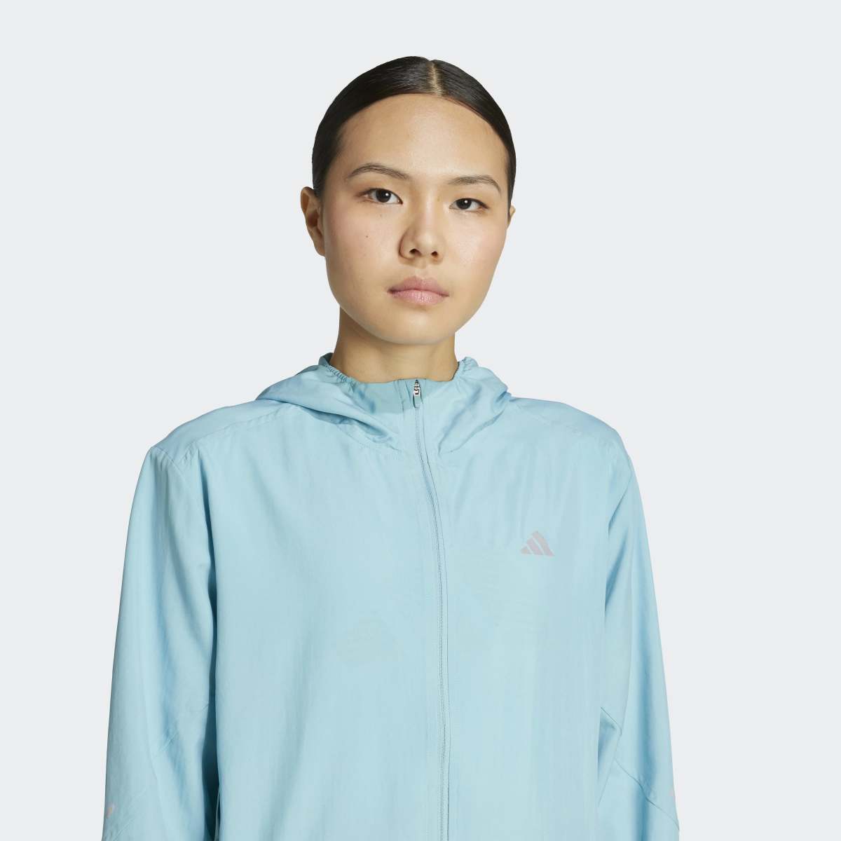 Casaco Corta-Vento de Mulher Run It Turquesa-4