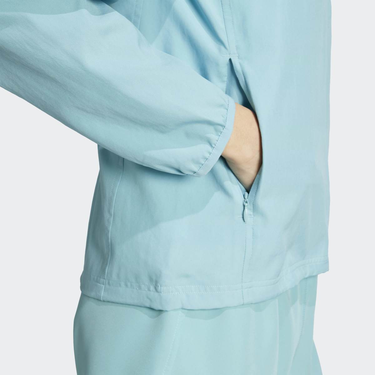 Casaco Corta-Vento de Mulher Run It Turquesa-5