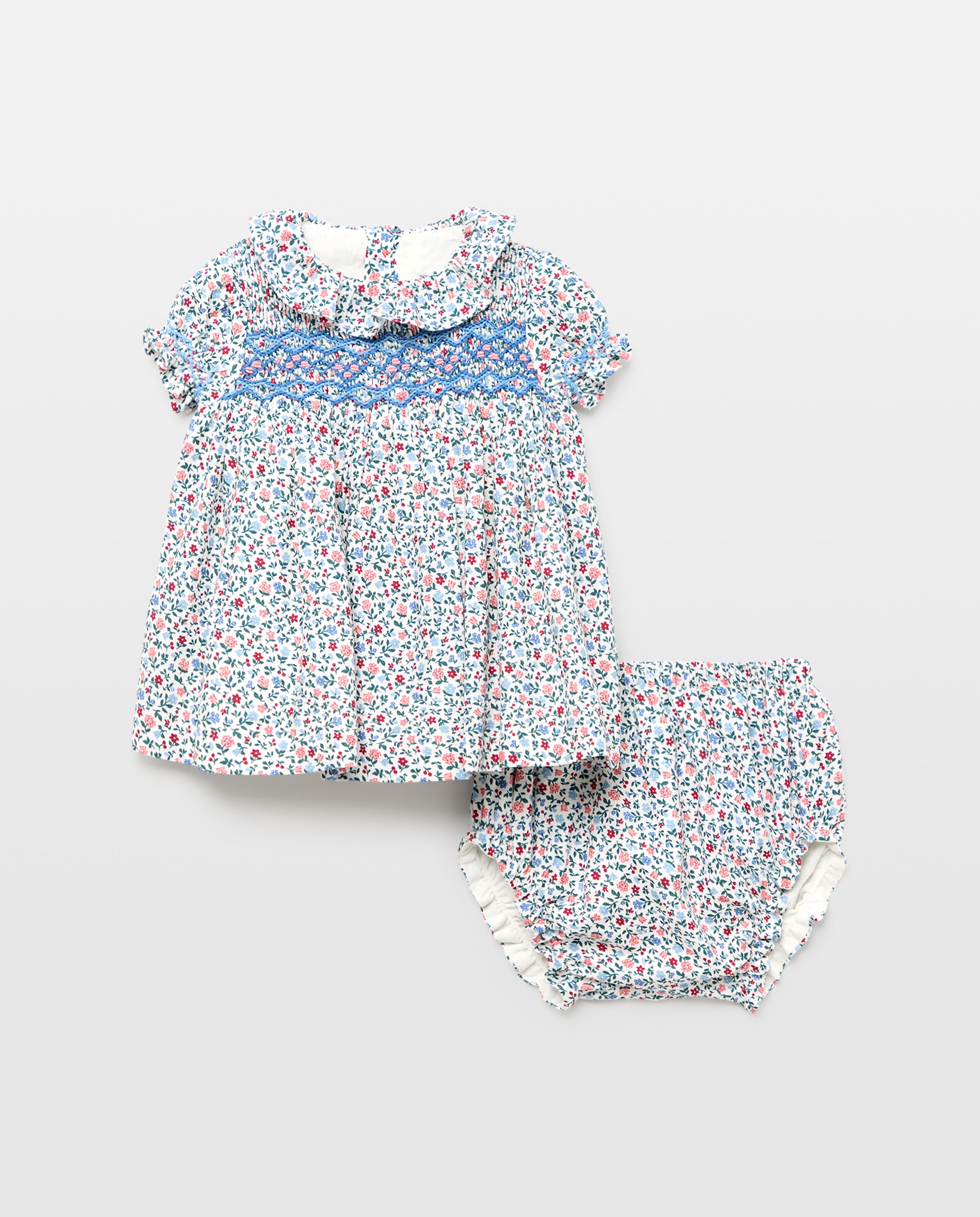 Imagen 1 de Vestido de bebé niña con nido de abeja y estampado de flores Azul