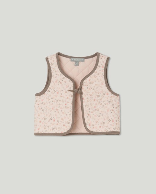 Imagen 0 de Chaleco micropana reversible all over print flores sueltas de bebé niña