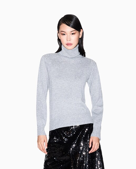 Imagen 0 de Jersey de mujer cuello vuelto con hilos de lurex