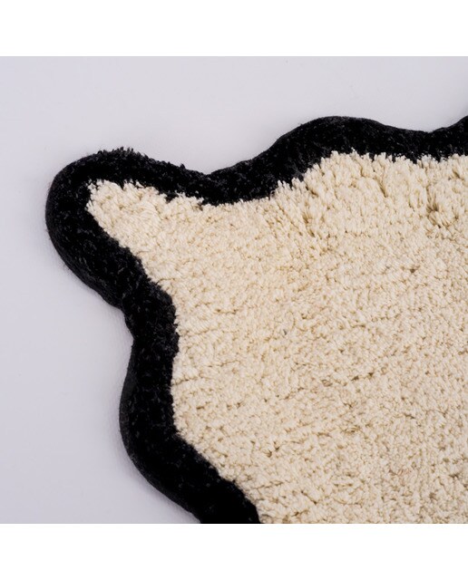 Alfombra de baño Flamingueo blanca y negra con borde ondulado 4