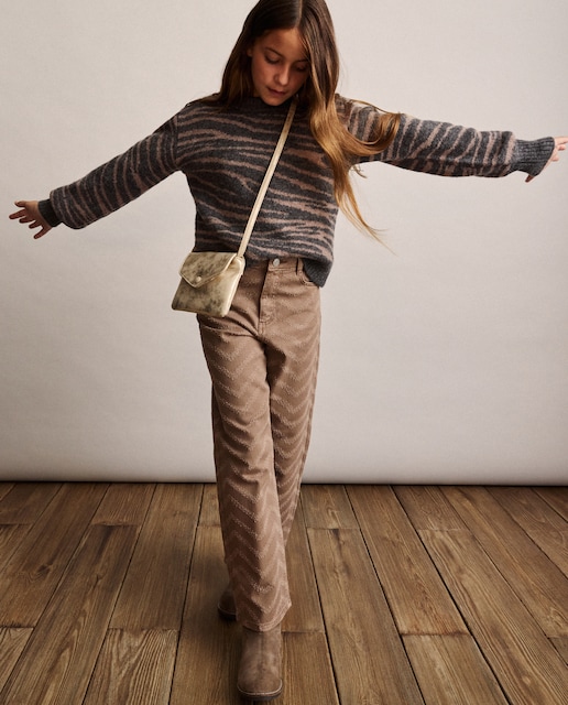 Imagen 0 de Pantalón denim tejido roto desflecado de niña