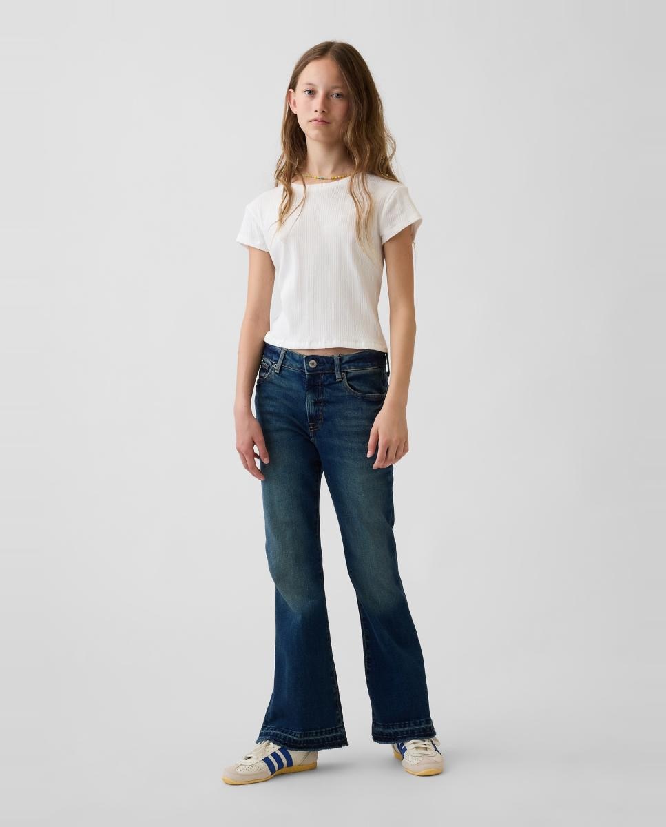 Imagem 0 de Jeans Lisas com Bolso de Remendo