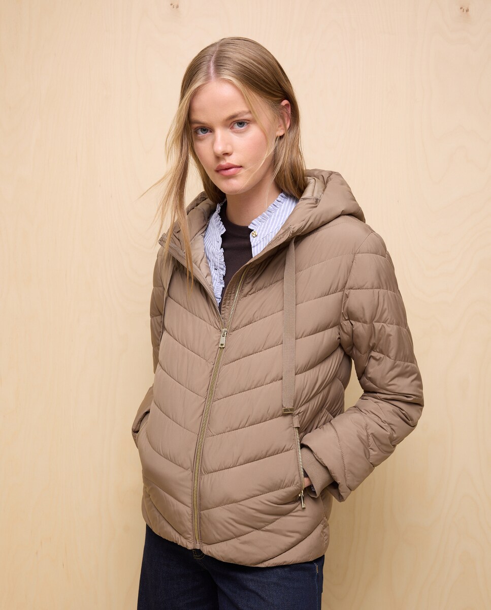 Acolchado de mujer largo cadera con manga de punto · Easy Wear