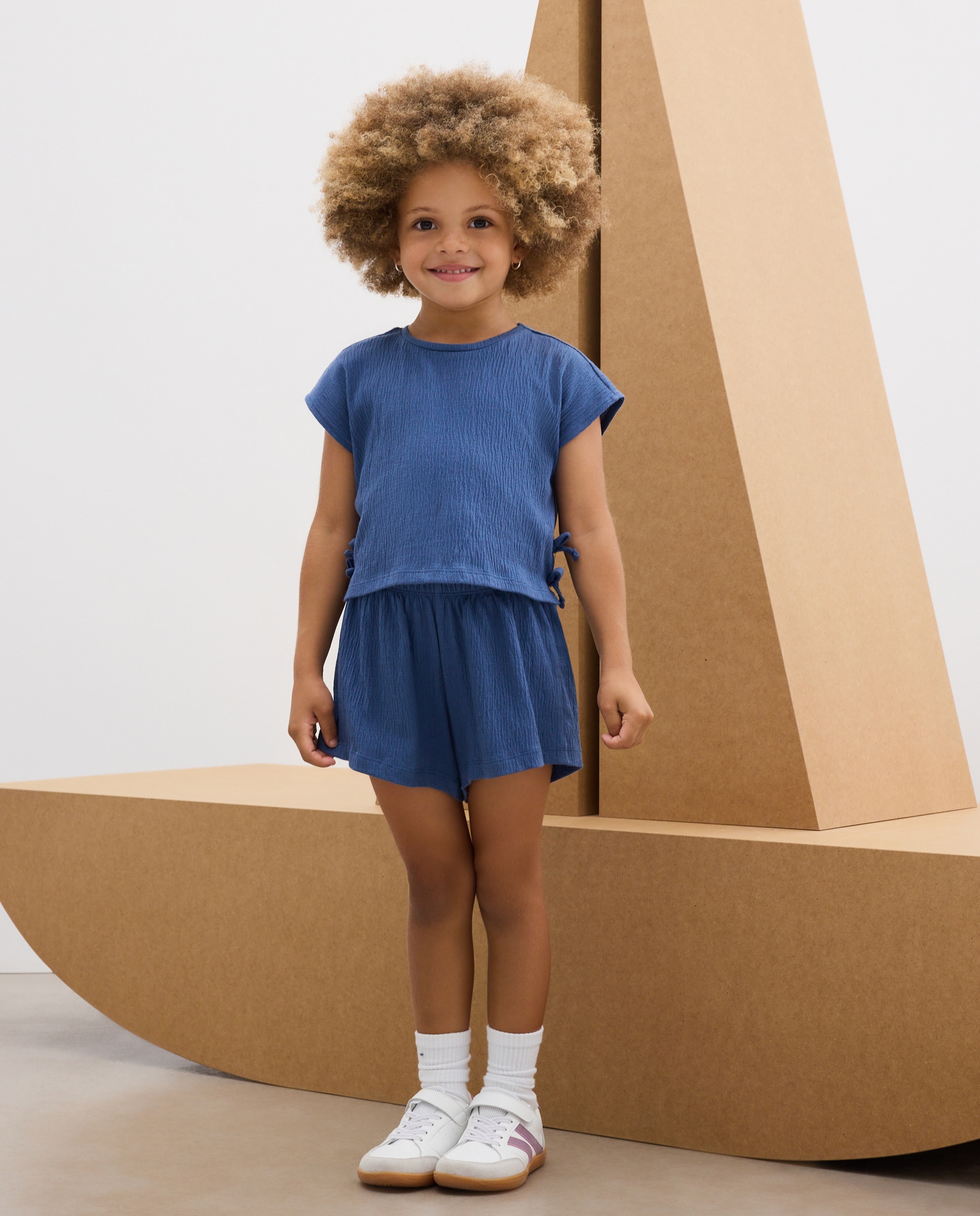 Imagen 1 de Conjunto corto de niña tejido wrinkled con lazos laterales - Kids El Corte Inglés - 400 Azul 400 Azul
